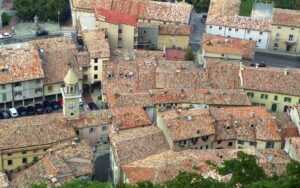 an aerial view of a city with many buildings
