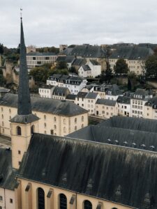 Charming aerial view of historic rooftops in Luxembourg City, showcasing the city's architectural beauty.
