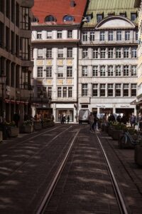 a train track between buildings
