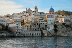 A coastal town nestled on a rocky cliff.